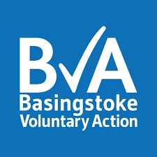 White "Basingstoke Voluntary Action" text and a check mark on a blue background. - Home Instead