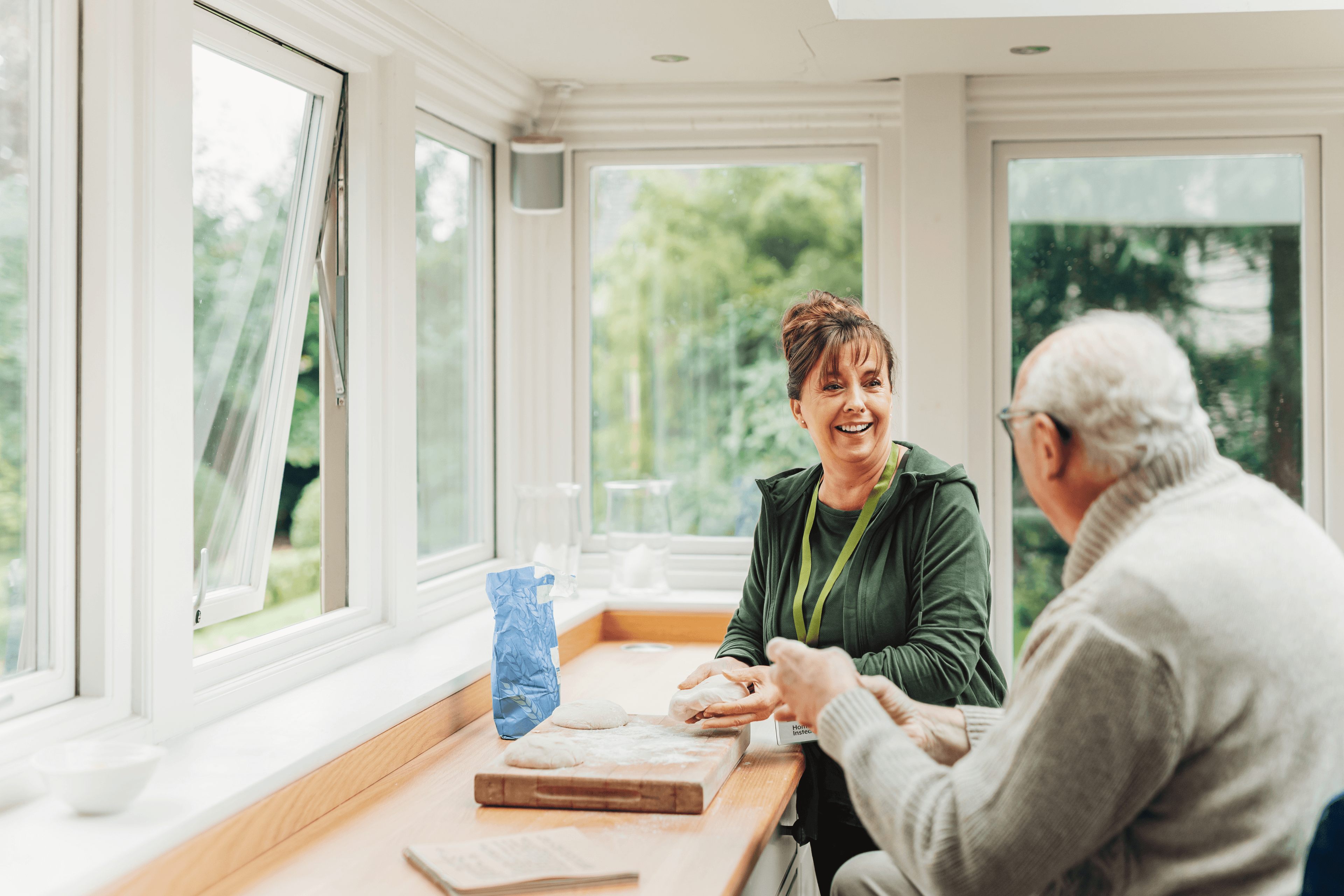 Client and Care Professional making dough - Home Instead