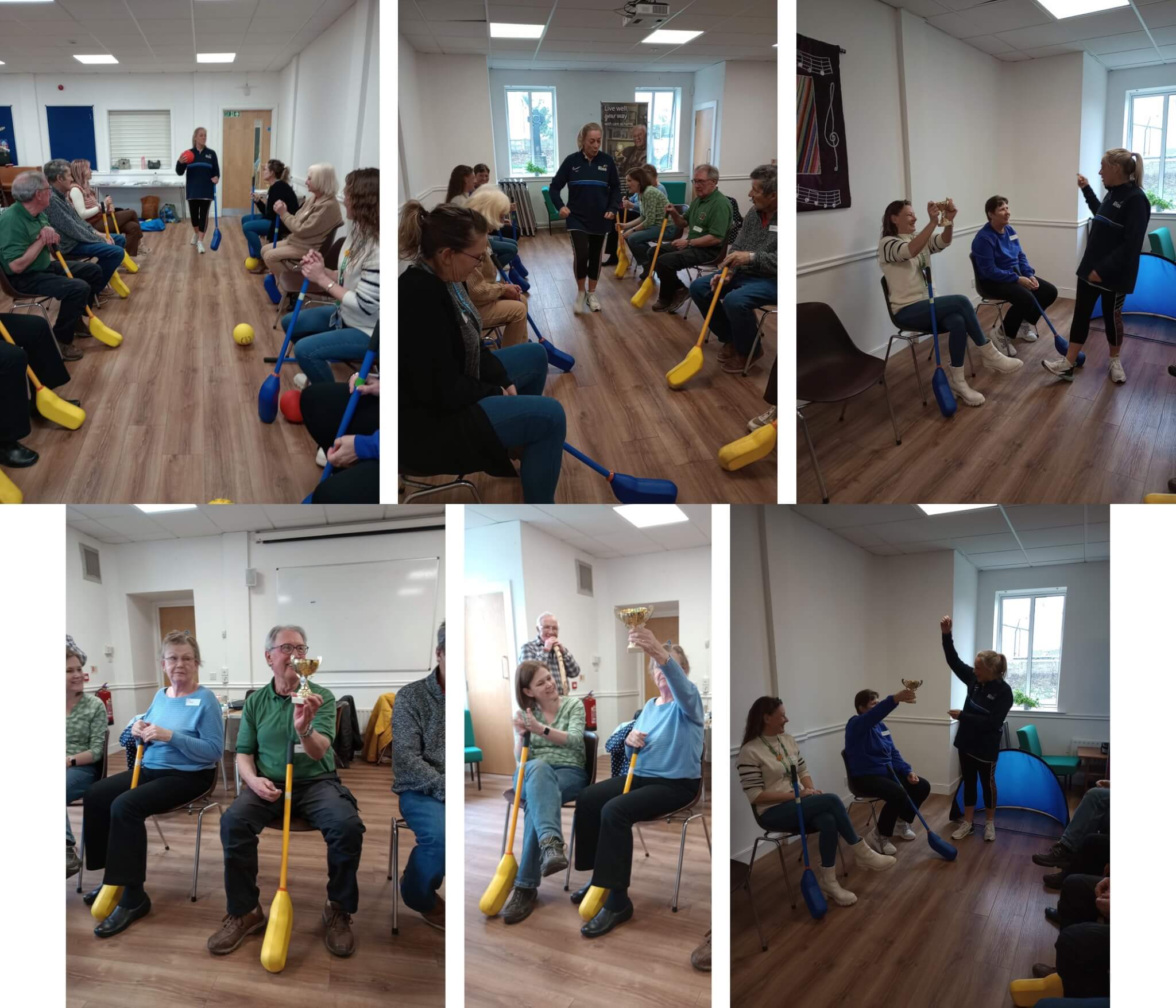 A group of elderly people having a fun indoor activity session, playing games and holding trophies. - Home Instead