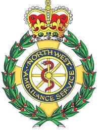 Emblem of the North West Ambulance Service featuring a crown, a staff with a serpent, and a laurel wreath. - Home Instead