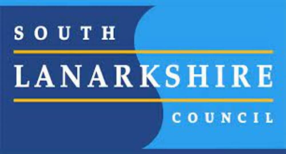 Logo that reads "South Lanarkshire Council" with blue and yellow color scheme. - Home Instead