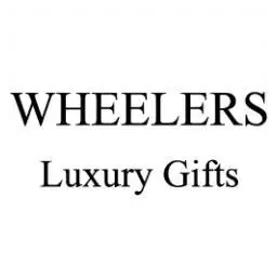 WHEELERS Luxury Gifts" text in black font on a white background. - Home Instead
