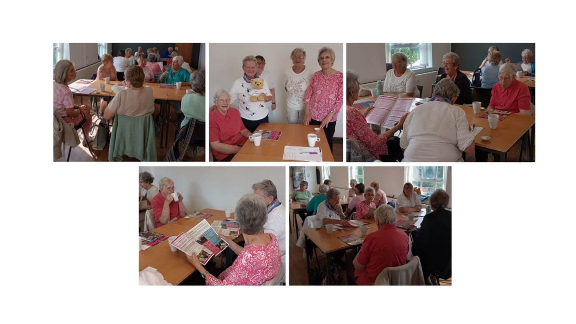 A group of elderly individuals engaged in activities like reading and conversing at tables in a communal space. - Home Instead