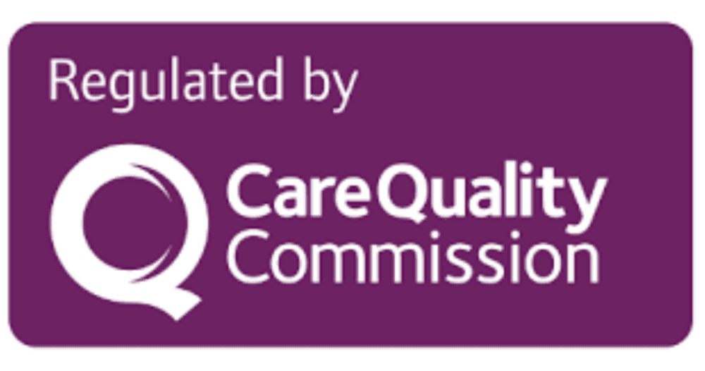 A purple sign reads "Regulated by Care Quality Commission" with the Commission's logo on the left. - Home Instead