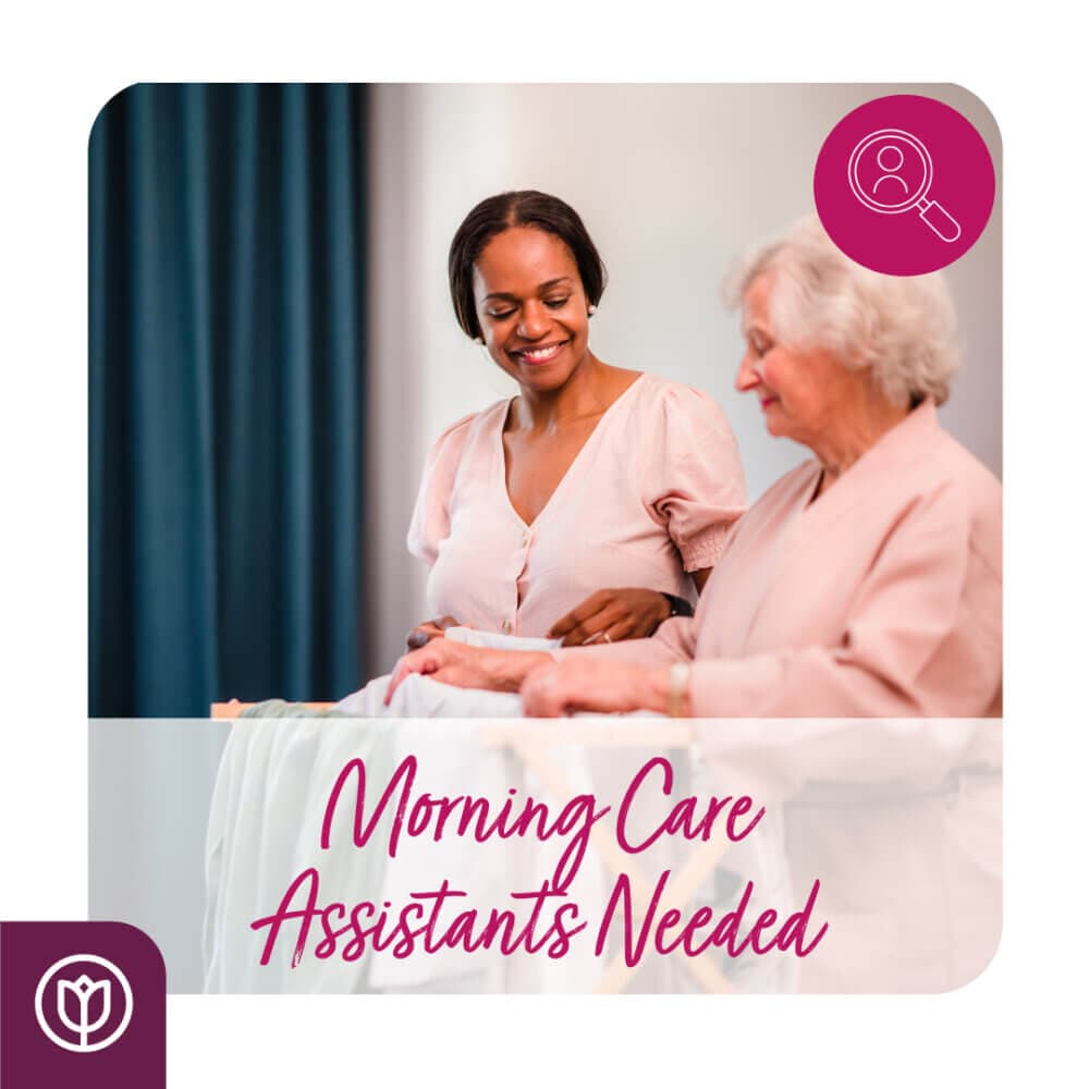 A caregiver assisting an elderly woman with "Morning Care Assistants Needed" text overlayed. - Home Instead