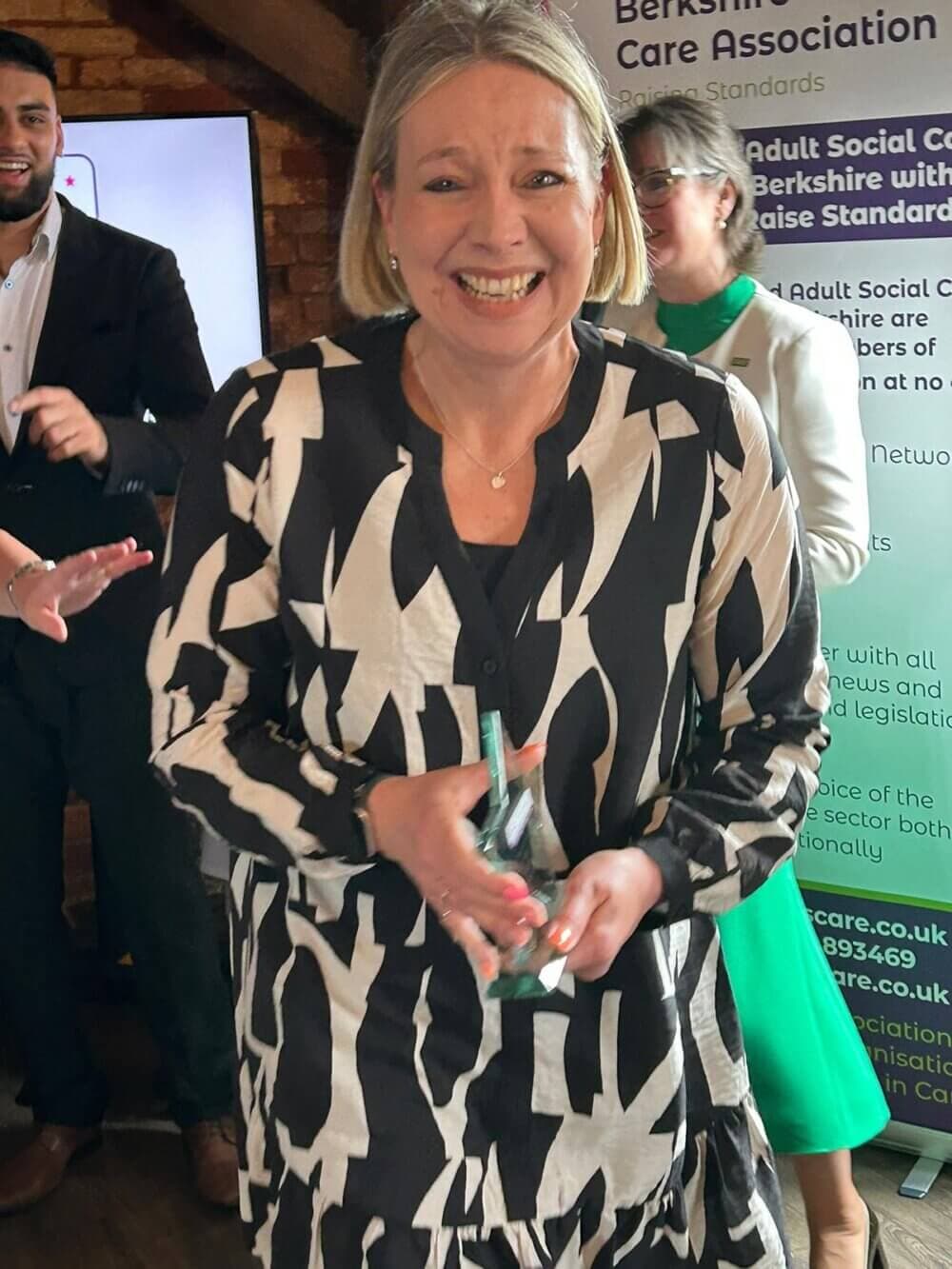 Julia receives her Care worker of the Year Award Home Instead BCA Berkshire Care Awards