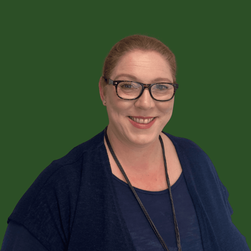 A woman in a black dress holds a winner's trophy and certificate at the Dementia Care Awards 2024 event. - Home Instead