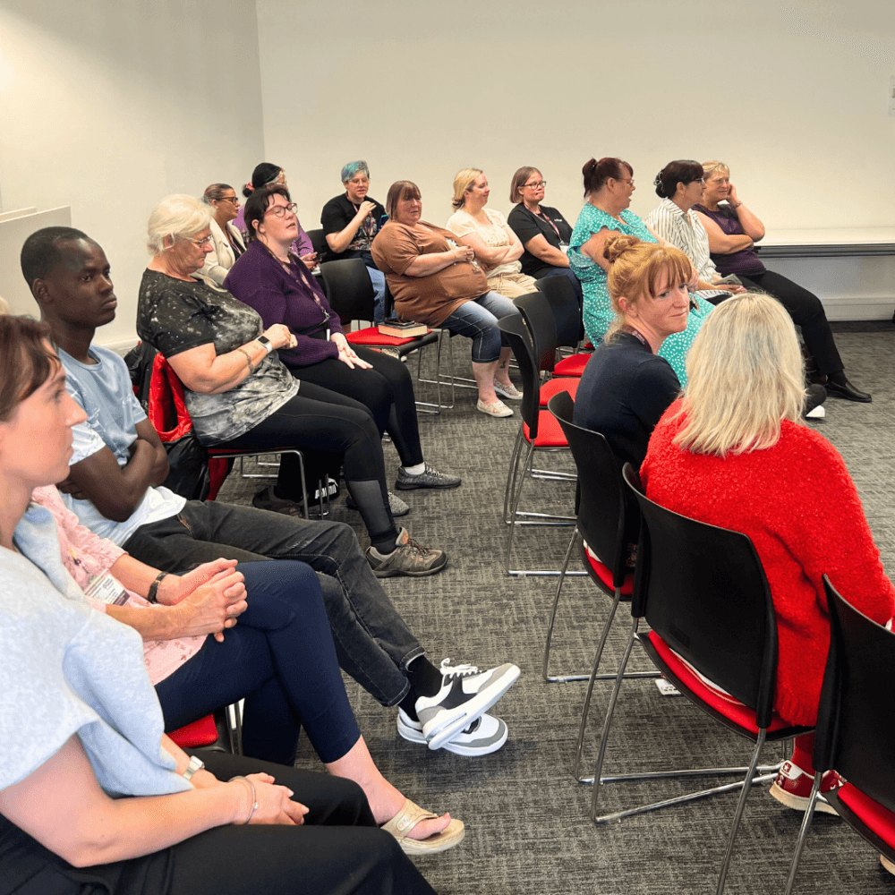 group of care pros during the care pro meeting