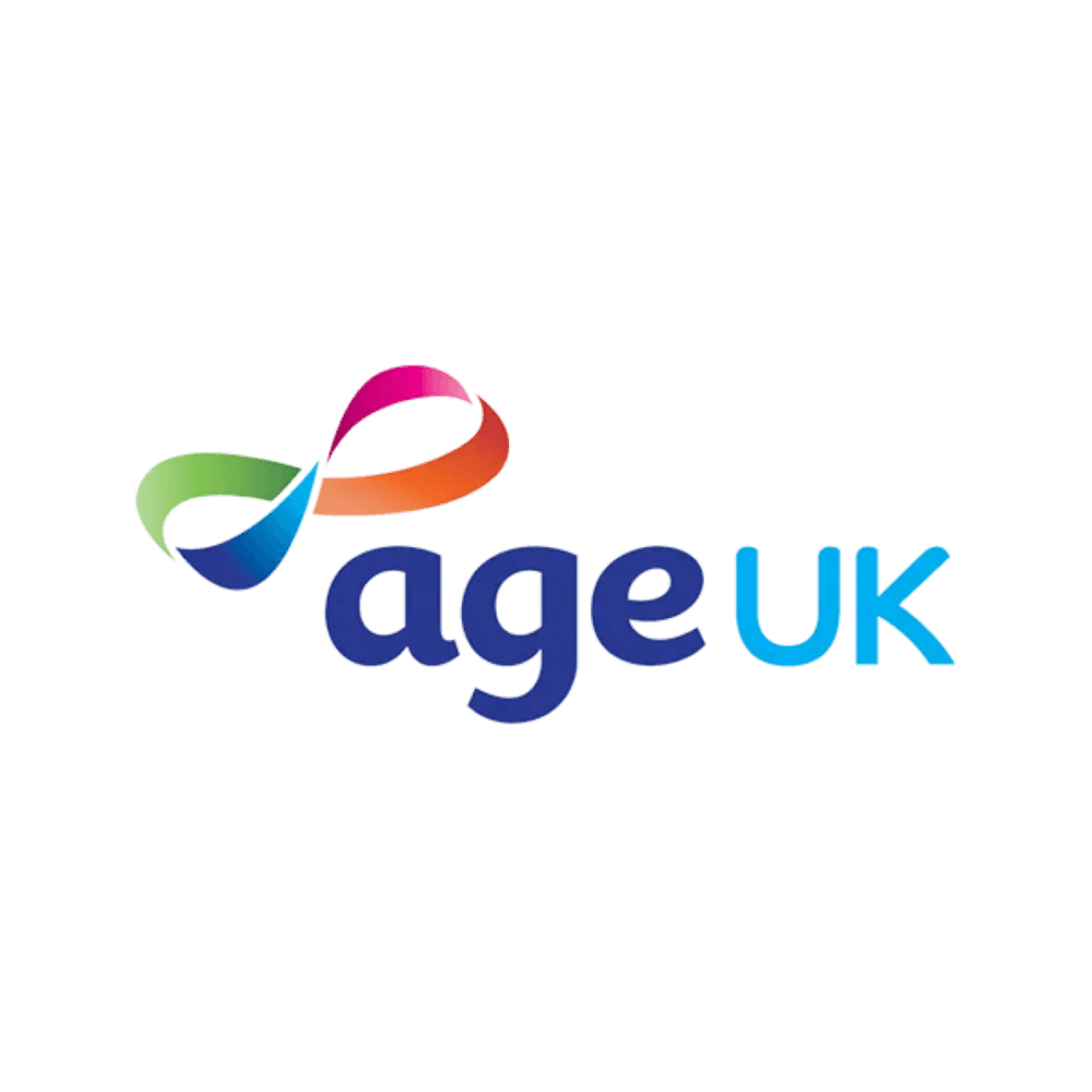 Age UK logo with a colorful ribbon design above the words "age UK" on a white background. - Home Instead