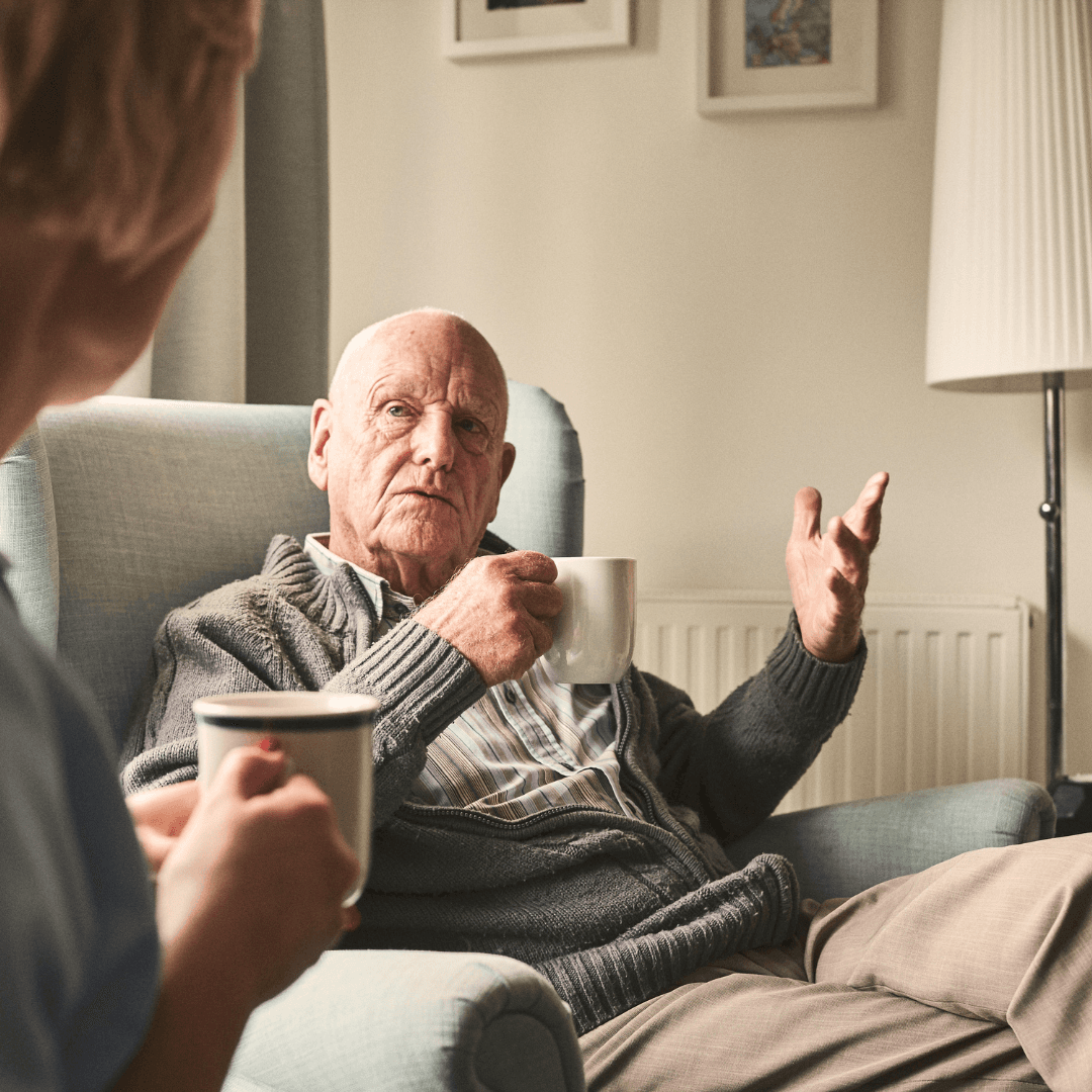 Home Care Visit with cup of tea