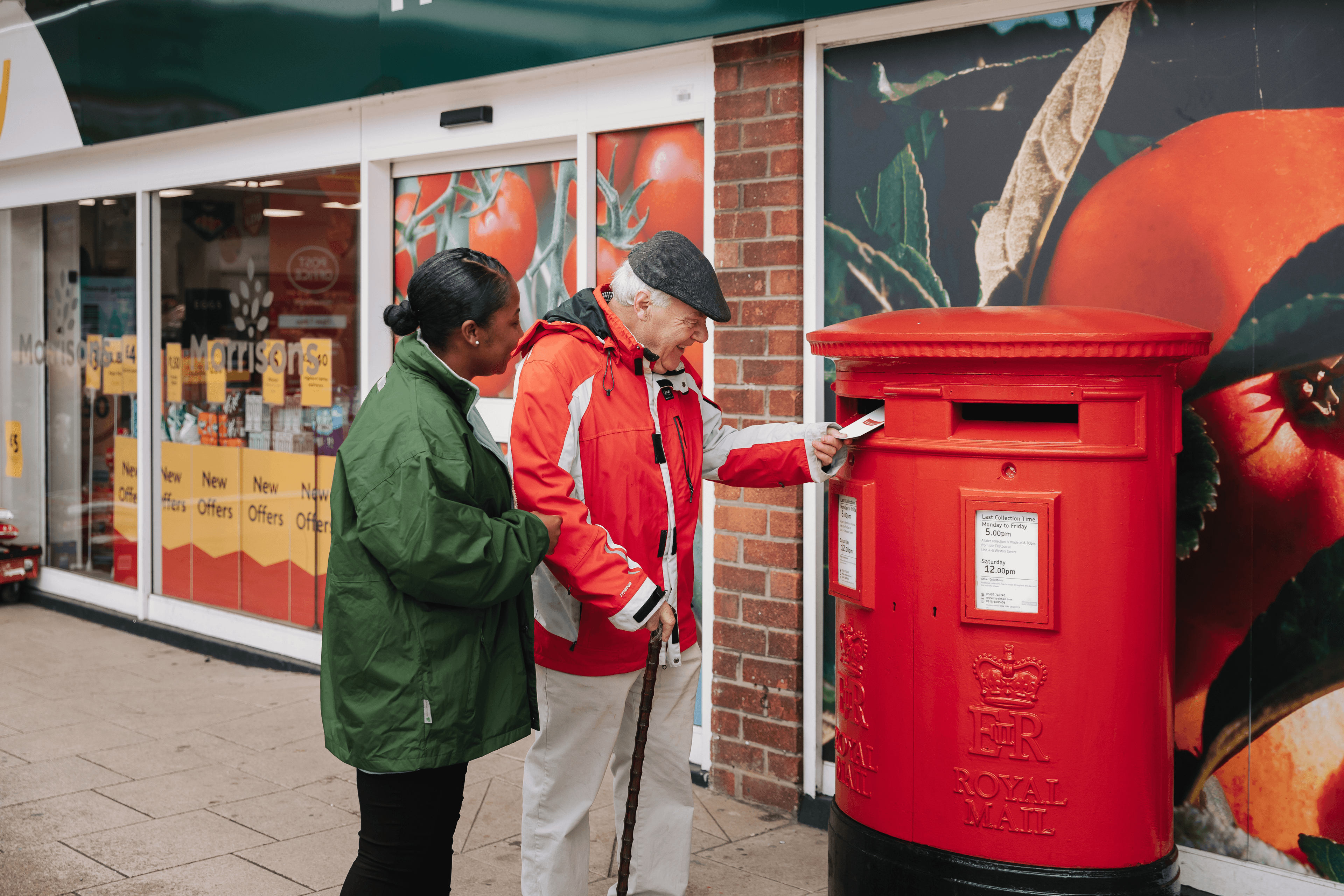 Care Professional and Client at postbox - Home Instead