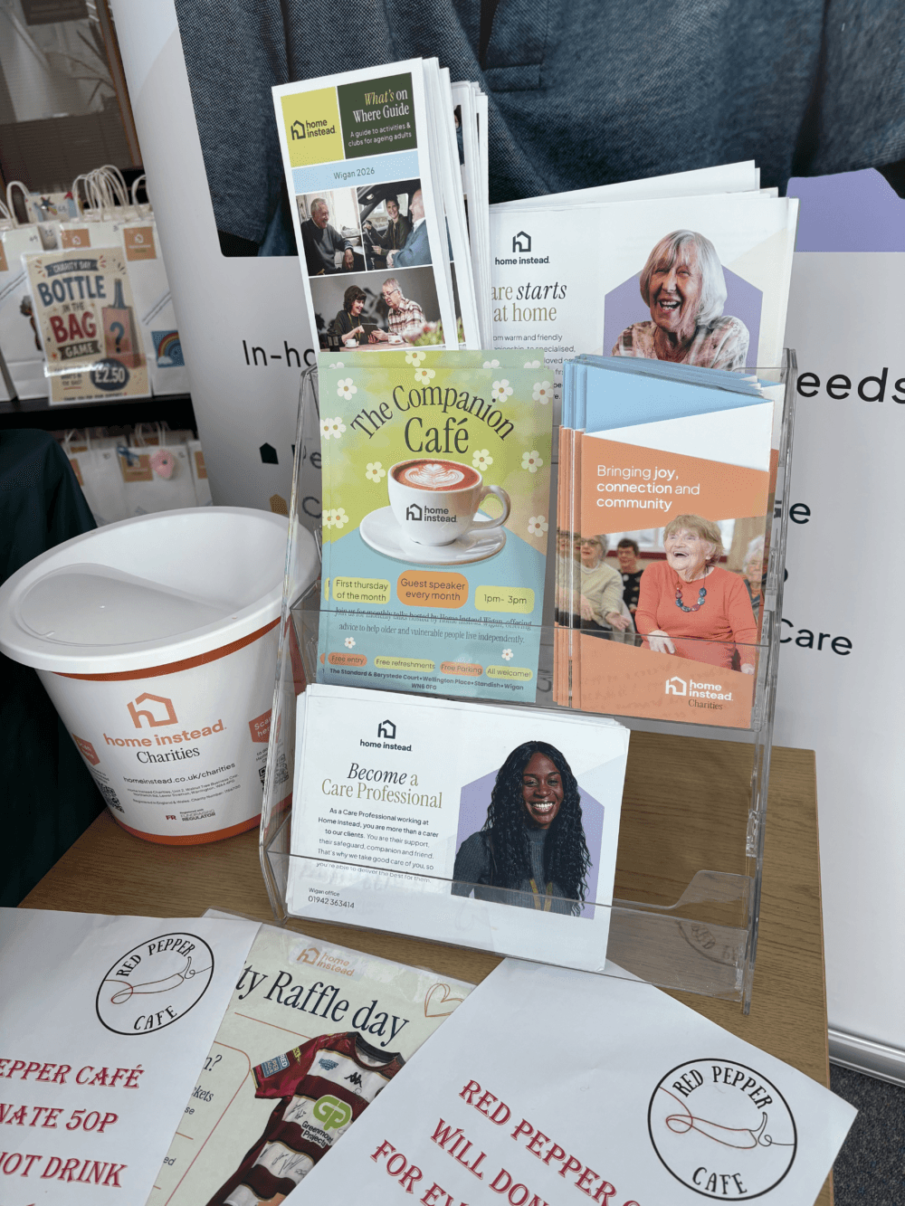 Leaflets and raffle prizes - Home Instead