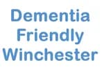 Blue text reads "Dementia Friendly Winchester" on a white background. - Home Instead