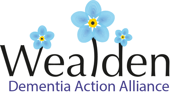 Wealden Dementia Action Alliance logo featuring three blue forget-me-not flowers. - Home Instead