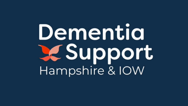 Logo for Dementia Support Hampshire & IOW with an orange butterfly on a dark blue background. - Home Instead