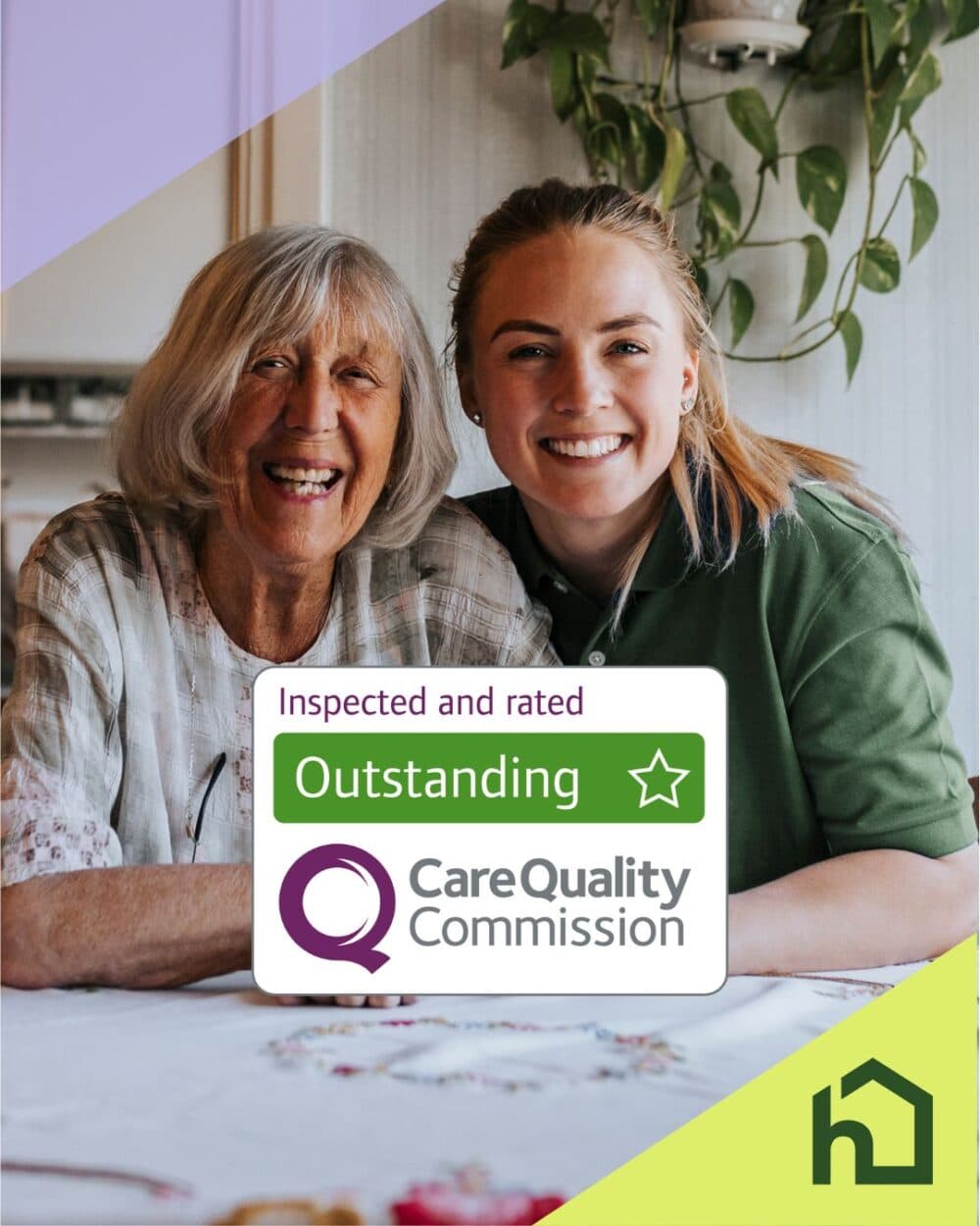 Smiling elderly woman and young carer with a Care Quality Commission "Outstanding" rating sign. - Home Instead