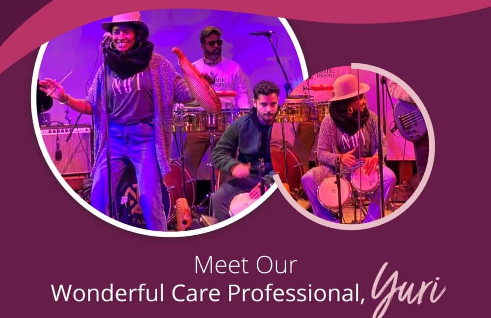 A musician playing drums on stage, with a crowd and colorful lights. Text: "Meet Our Wonderful Care Professional, Yuri. - Home Instead