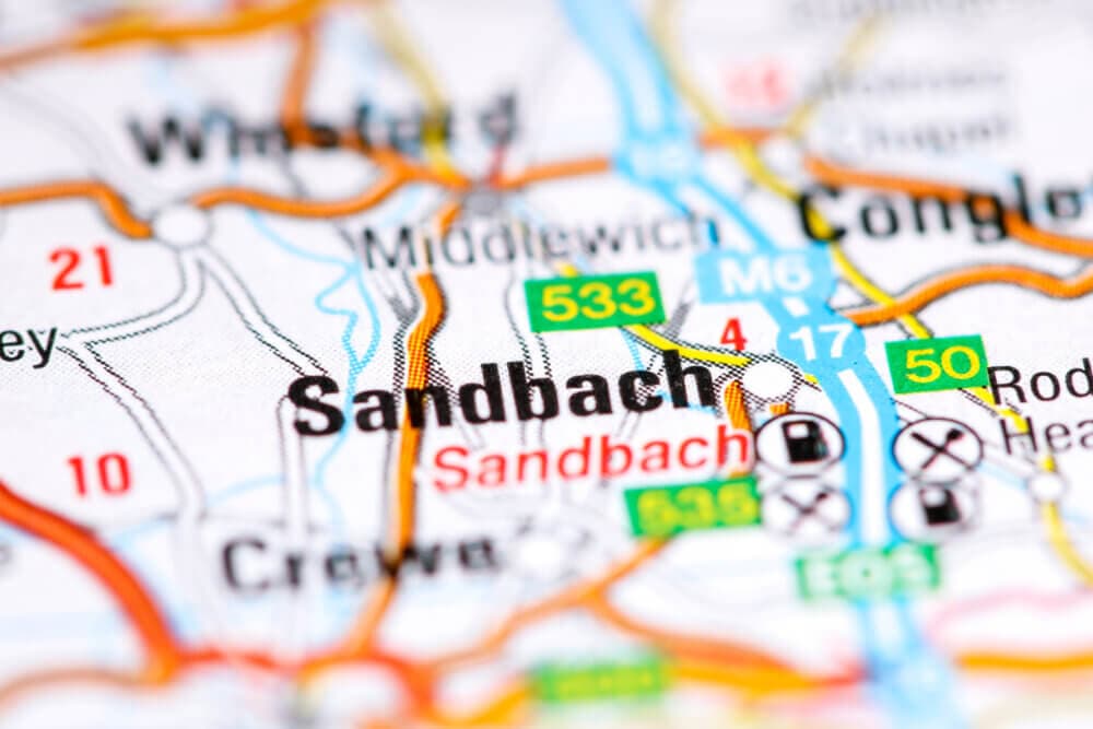 Close-up of a detailed map showing Sandbach, with neighboring towns and roads highlighted. - Home Instead