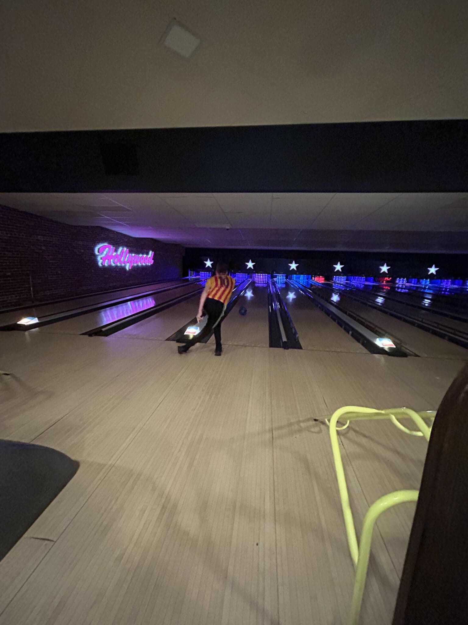 Home Instead Basingstoke picture of a man bowling at Hollywood 10-Pin Bowling in Basingstoke