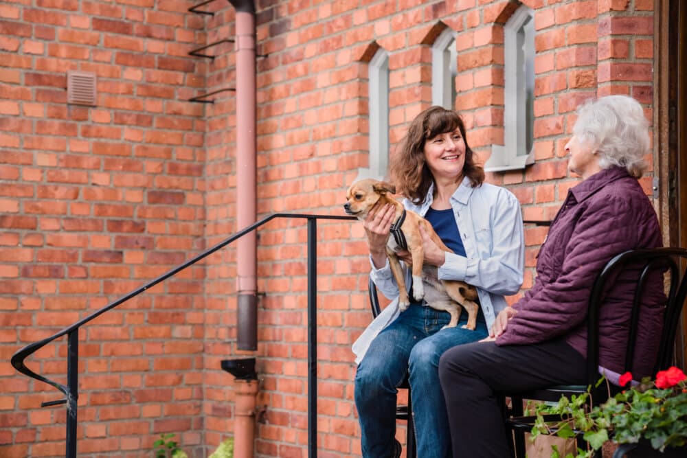 Client with pet and Care Professional - Home Instead