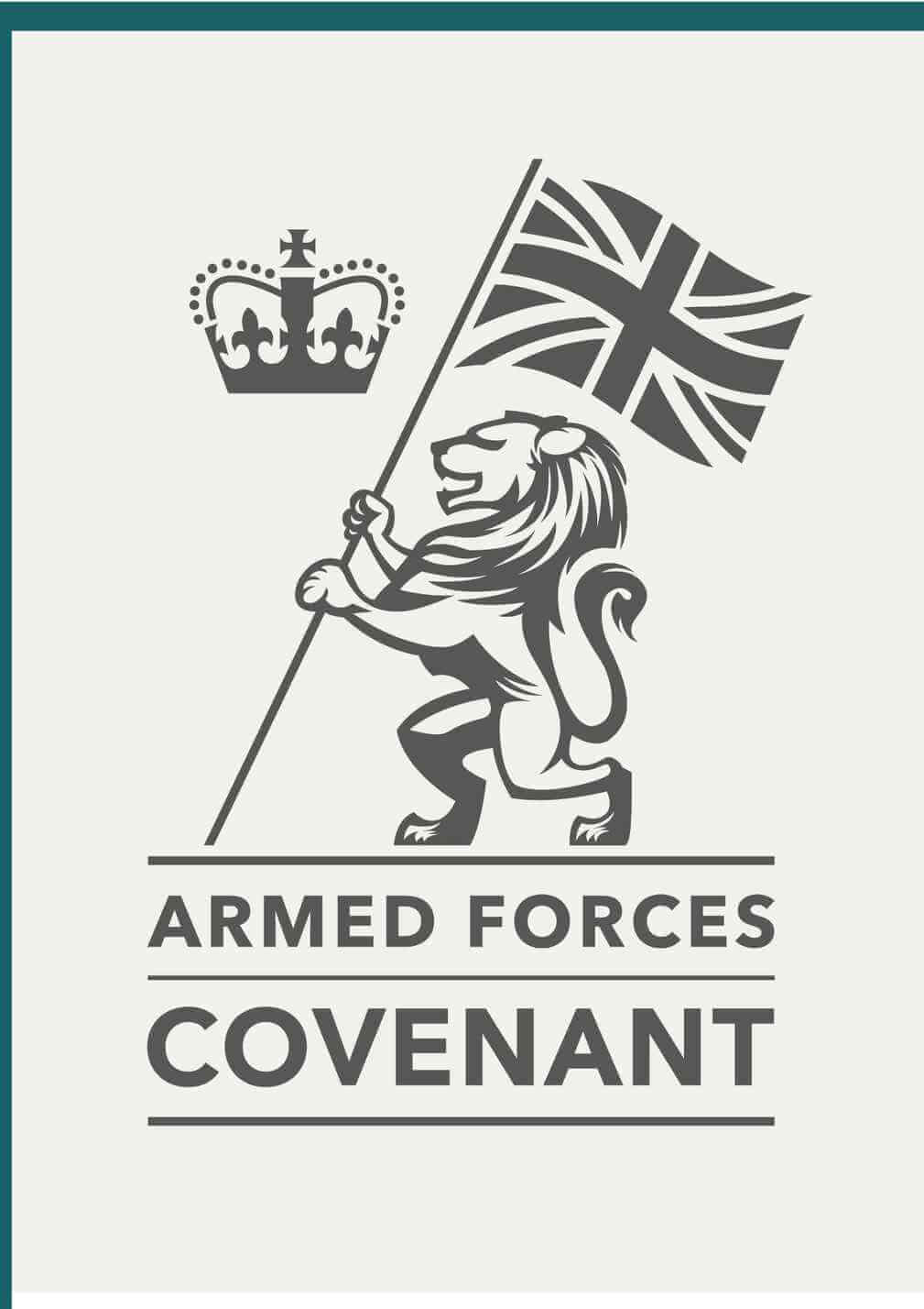A lion holding a Union Jack flag with a crown above and the text "Armed Forces Covenant" below. - Home Instead