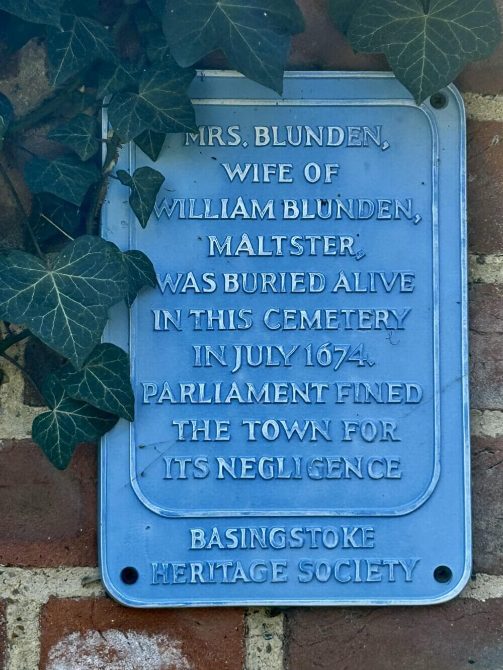 Home Instead Basingstoke picture of blue plaque to Alice Blunden, who was buried alive in July 1674