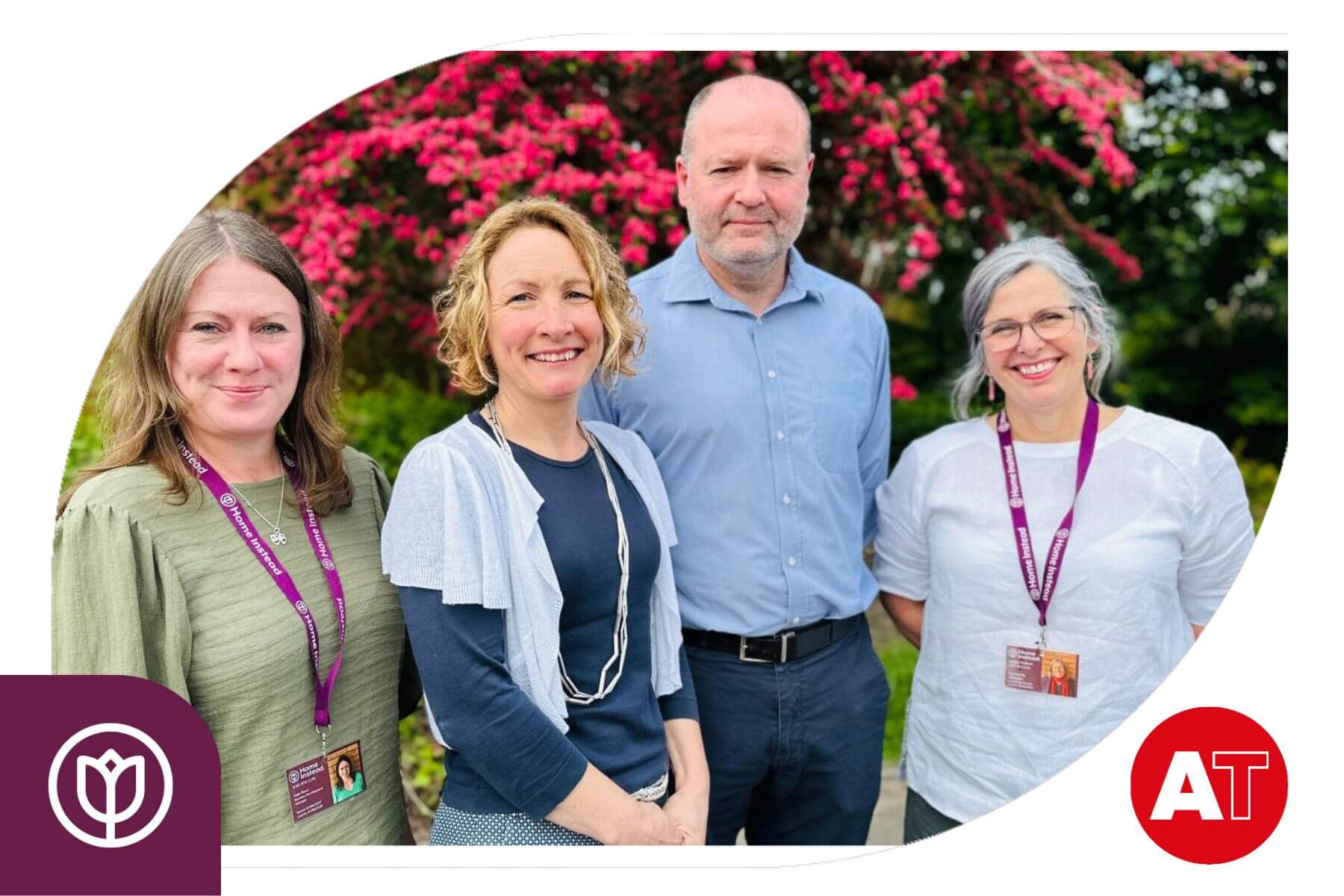 Four adults smiling, standing outdoors; two women with ID badges on the left, a man and another woman on the right. - Home Instead