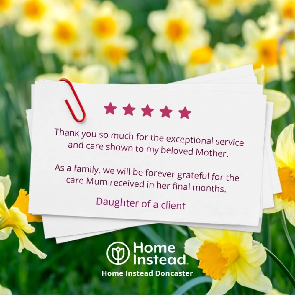 Cards with a thank you message attached to a paperclip, surrounded by daffodils, with Home Instead logo at the bottom. - Home Instead