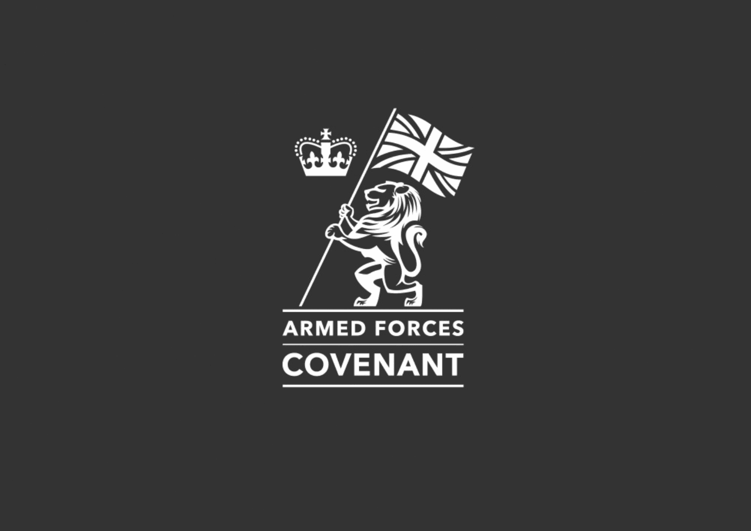 Logo of the Armed Forces Covenant with a lion holding a British flag and a crown symbol above the text. - Home Instead