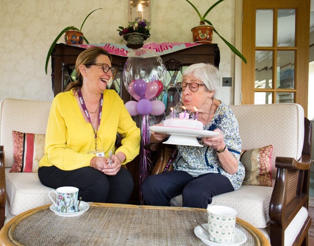 Home Instead client celebrating her birthday with her Home Instead carer
