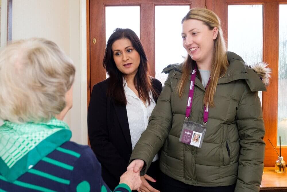 Home Instead care manager introduces a Home Instead carer to a Home Instead client.