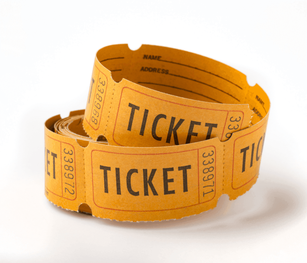 A roll of orange tickets with black text reading "TICKET" on each ticket against a white background. - Home Instead