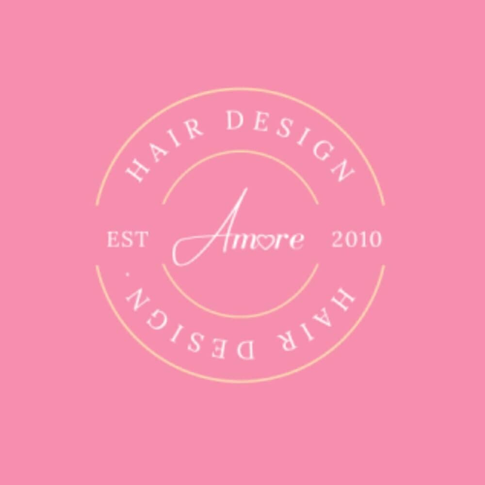 Pink logo with the text "Amore Hair Design" and "EST 2010" inside a circular design. - Home Instead