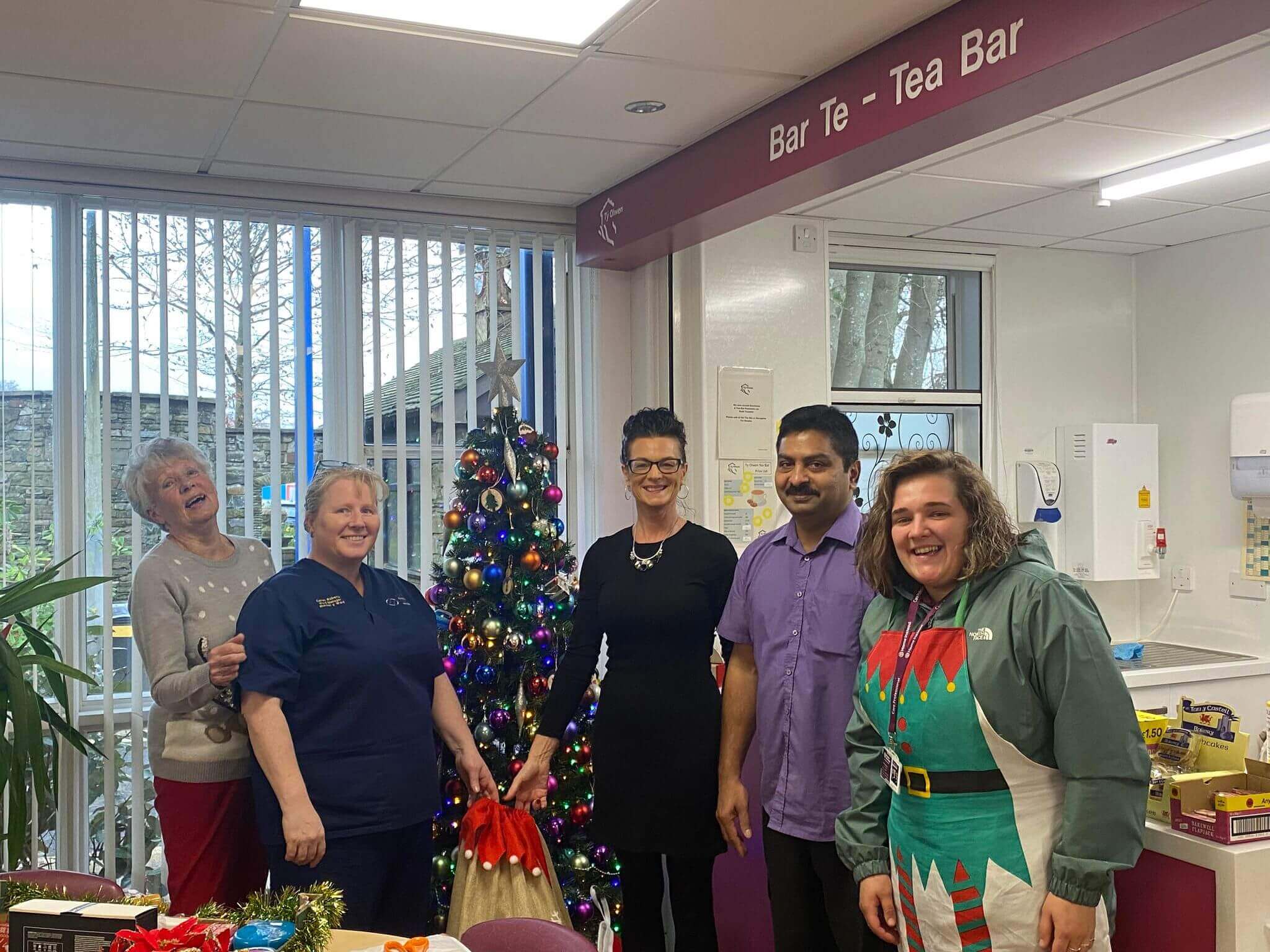 Gift donations dropped off to Ty Olwen Hospice with gifts for clients