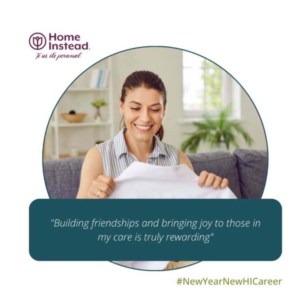 A woman is smiling and folding clothes, with a quote overlay about finding joy and reward in caregiving. #NewYearNewHICareer. - Home Instead
