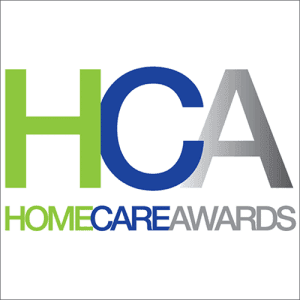 Logo of Home Care Awards featuring "HCA" in large letters with "HOME CARE AWARDS" underneath, in green, blue, and gray. - Home Instead