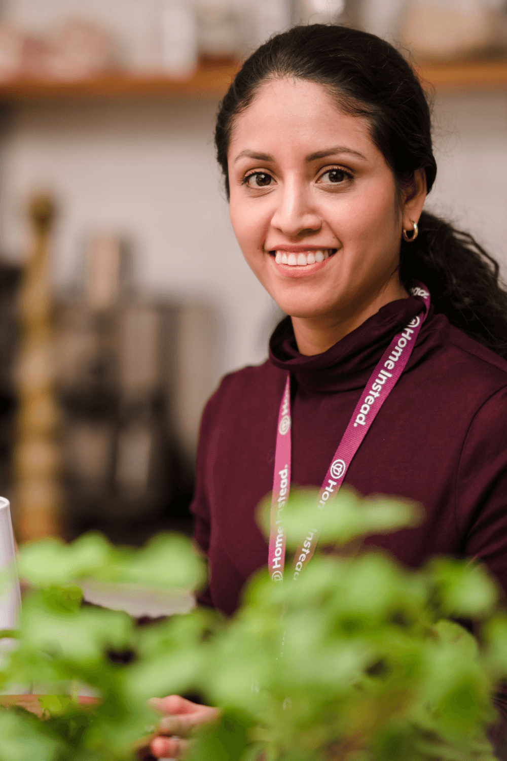 young female home instead care professional smiling