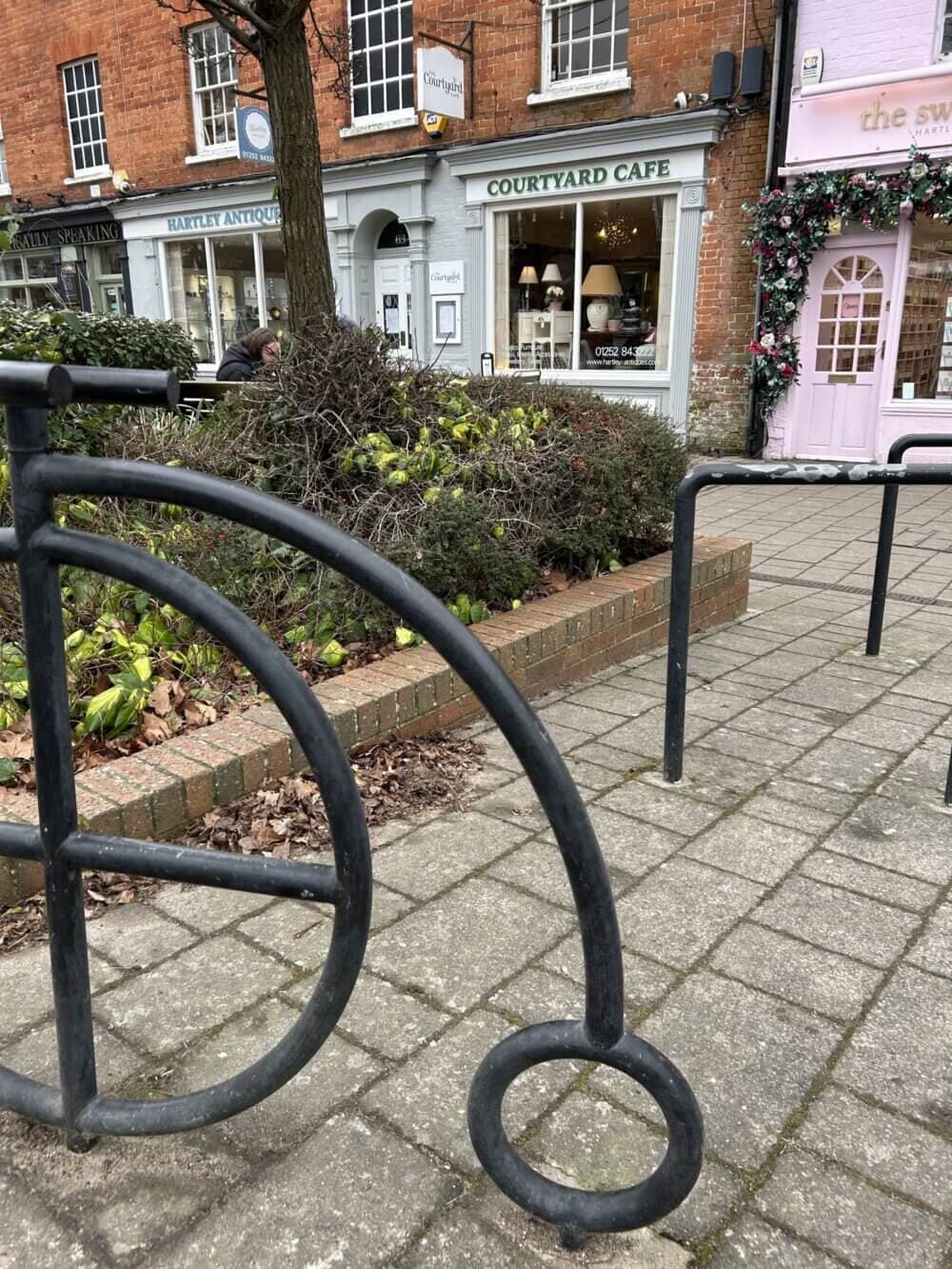 Penny farthing sculpture in the High Street, Hartley Wintney