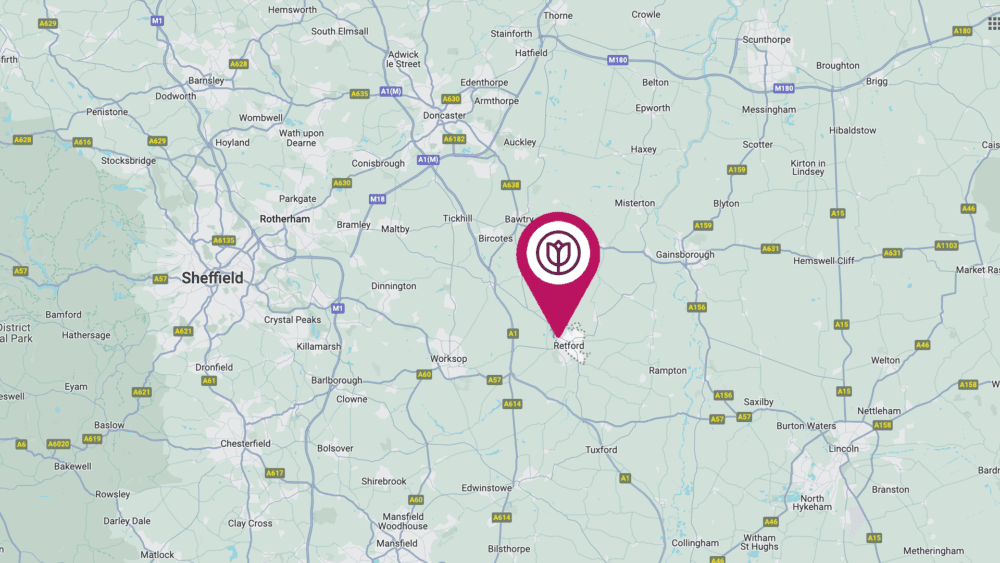 Map showing a red location marker near Retford, England. Nearby cities like Sheffield and Doncaster are labeled. - Home Instead