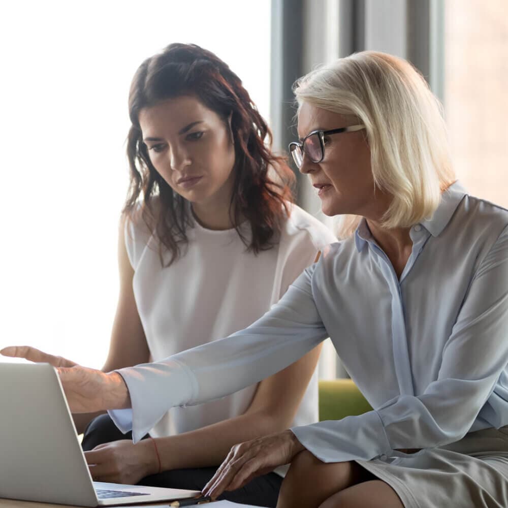 carer discussing information with an adviser