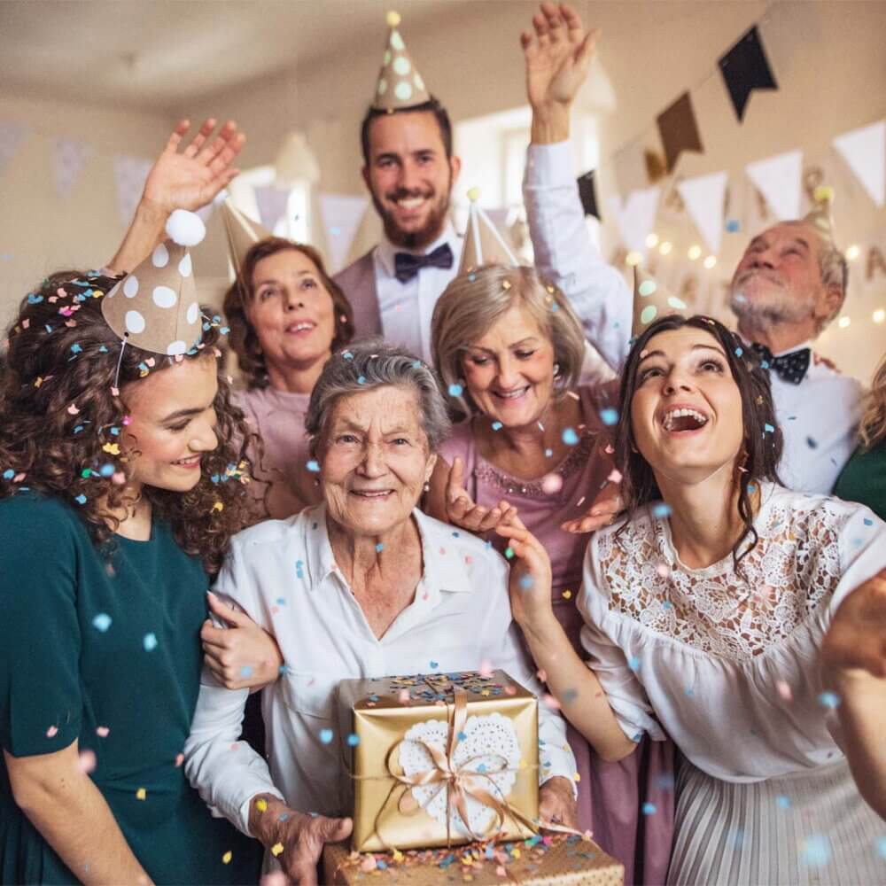 family gathered and celebrating their grandma