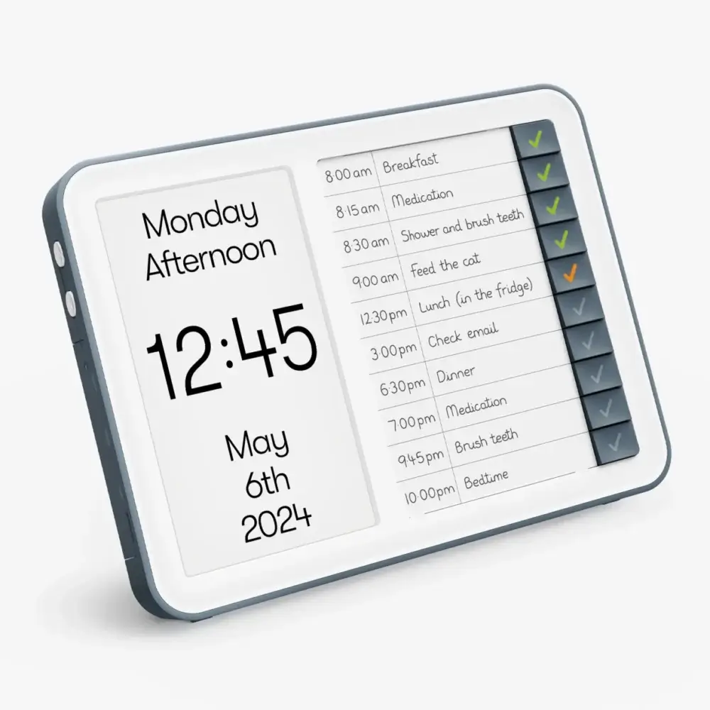 Digital alarm clock displaying Monday, May 6th, 2024, 12:45 with a daily schedule checklist on the right side. - Home Instead