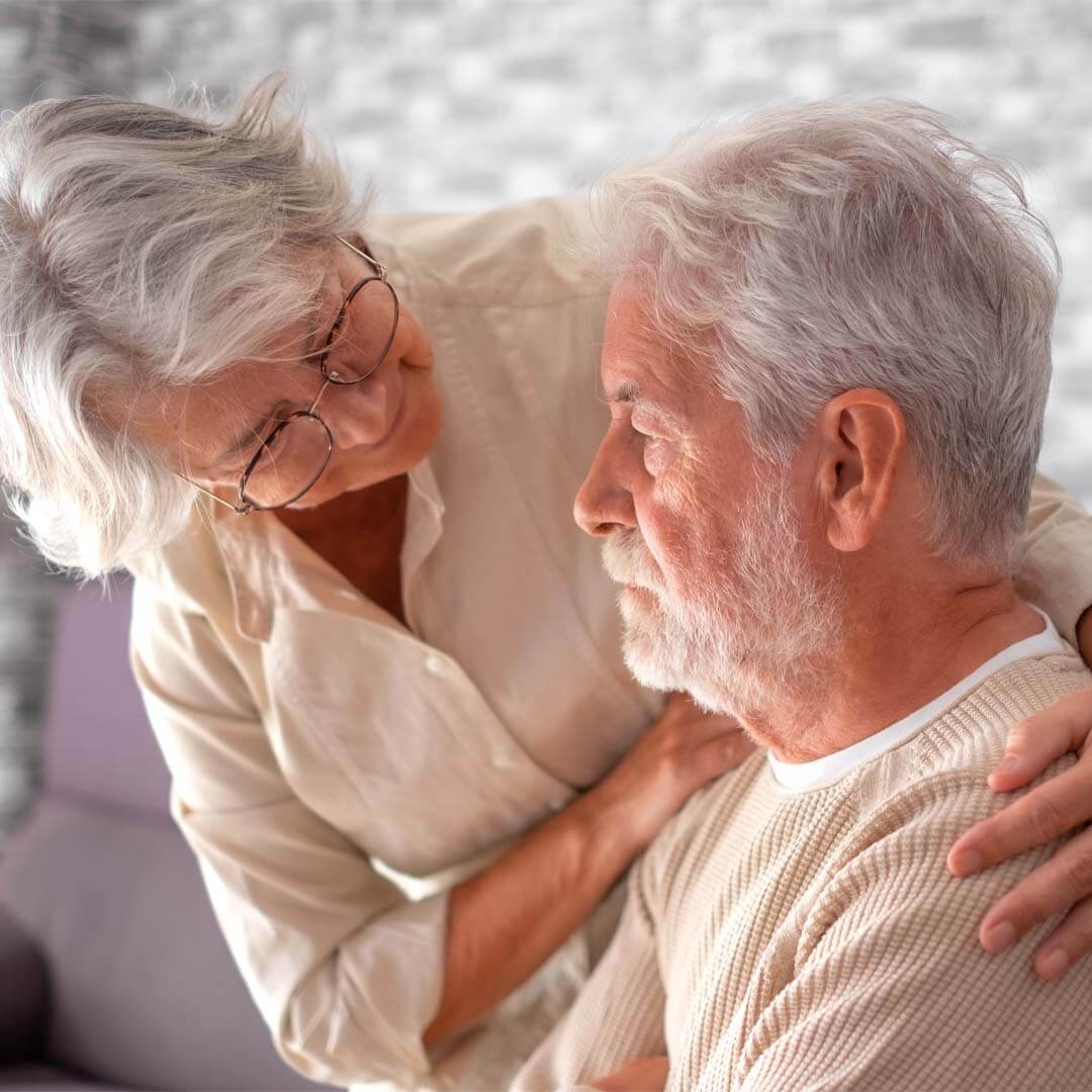older lady comforting her partner