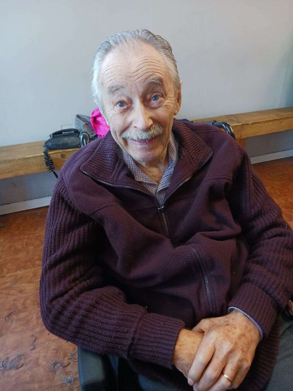 Older person smiling at home