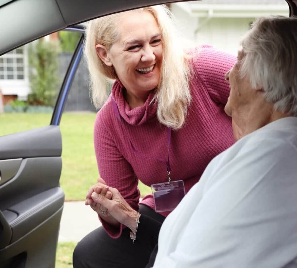 Home Instead Poole helping hand with client