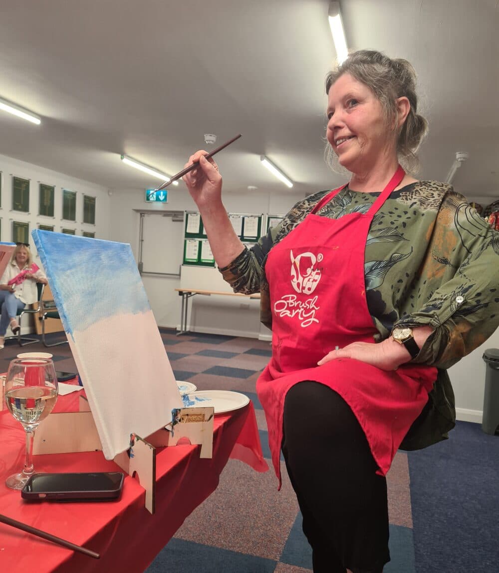 Janet posing as an artist