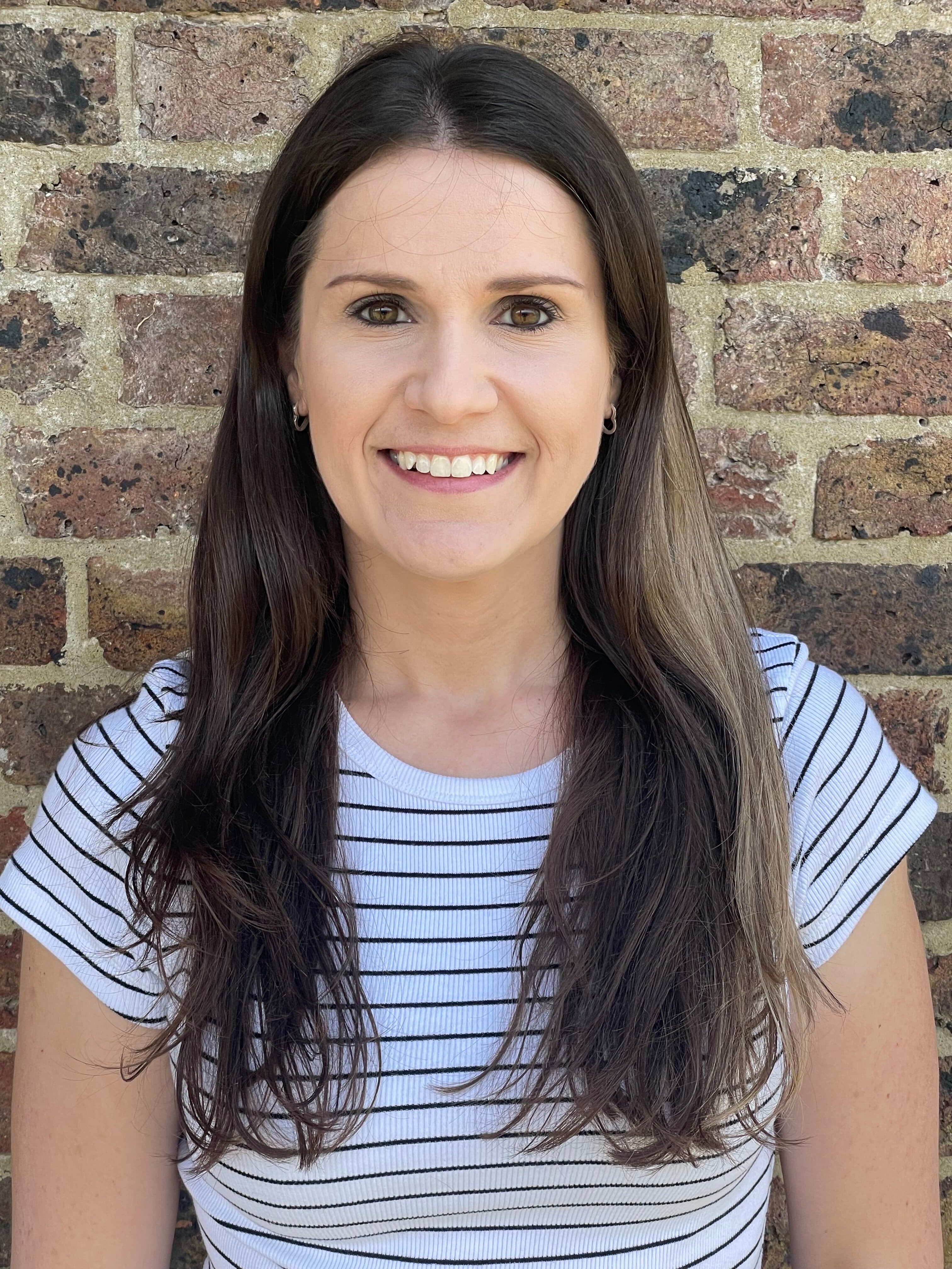 A photo of Home Instead Eastbourne's new Care Coordinator Hannah outside the office