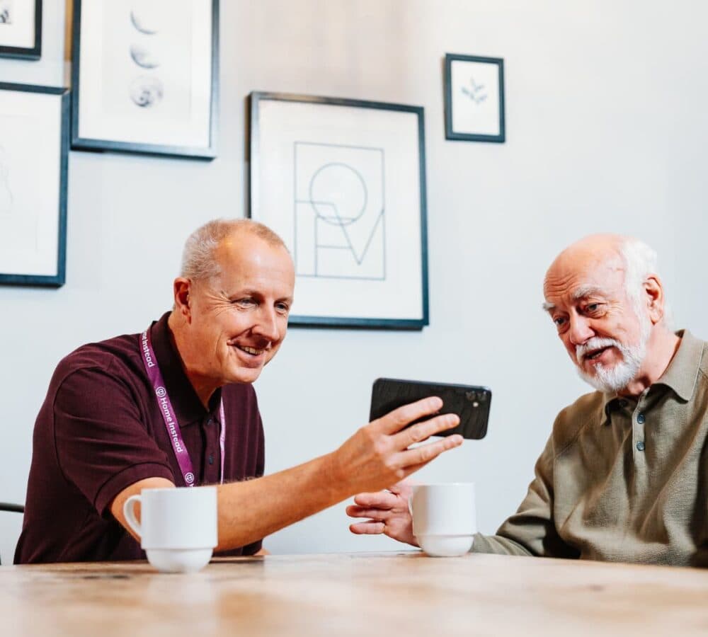 Home Instead Poole Care Professional with client