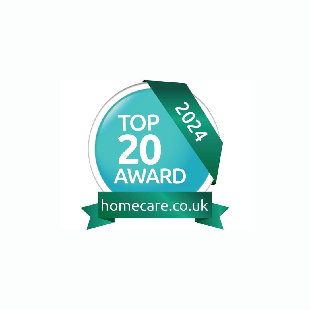A circular badge with a green ribbon displaying "2024 Top 20 Award," and "homecare.co.uk" at the bottom. - Home Instead