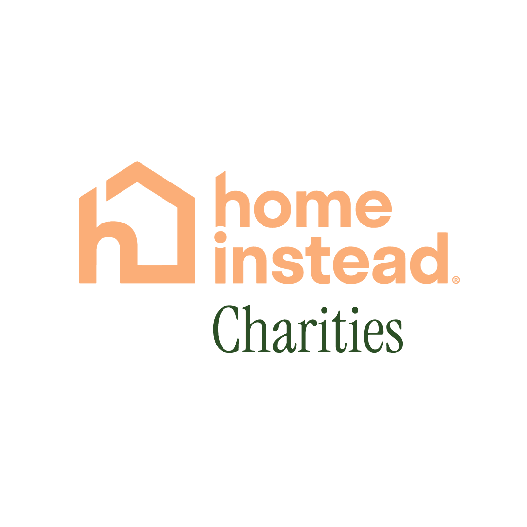 Home Instead Charities logo with an orange house icon and green 'Charities' text. - Home Instead